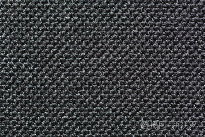 黑色合成纖維粗糙織物的紋理之美